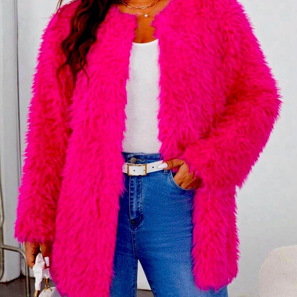 This is a very pretty sweater just right for spring! Brand new